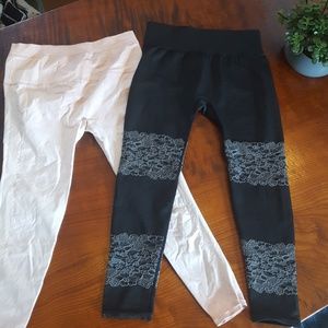 Black, acid wash Pink Fabletics capri leggings.